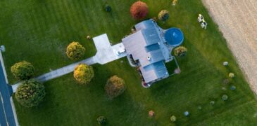 Having a lawn in the perfect shade of green is every homeowner's dream. Unfortunately, grass often fades and develops dead patches due to heavy foot traffic, wildlife infestation, heat, and other inexplicable factors. The bare patches in your lawn can be frustrating, but you can do a few things to make them thick and healthy again. For many homeowners, it might seem like a lot of work. That's why they often opt to hire a professional to do the lawn care for them. But if you have the time and energy, you can also do it yourself. Whatever way works best for you, here are some tips on growing a lush and vibrant lawn. Water Your Lawn Properly Watering the lawn seems like a simple task. But doing it properly is essential to grow and maintain the beautiful green appearance of the grass. The problem is, it can be confusing when and how long to water your lawn. With too little water, the grass would shrivel up and die after a few days. But, on the other hand, too much water can also make them more susceptible to disease. It's best to water it once or twice every week and around 15-20 minutes at a time to give your lawn a sufficient amount of water. This way, you'd be able to encourage deep root growth to your lawn. It will also help if you do the watering during the early morning. Since the hours are cooler and the wind calmer, the water will soak into the soil and grass roots. Mow The Lawn Appropriately If you aspire to have a lawn in a perfect shade of green, it's crucial to avoid over-stressing the grass. But improper mowing can cause additional lawn stress. For instance, cutting the grass too short can damage the roots and limit its nutrient supply, allowing weeds and insects to make their way to the soil quickly. In a single mowing, make sure not to cut more than one-third of the grass height. Mowing your lawn to the correct height once a week will ease the stress on the grass and result in a healthier lawn. Changing your mowing pattern regularly also helps the grass grow straight and thick as it avoids pushing the grass stems in the same direction all the time. Fertilize The Soil Regularly Just like other plants, the grasses in your lawn need food. But because of rainfall and irrigation, the nutrients in the soil can be washed away. As a result, it may not be able to provide all the nutrients your grass needs for thicker and healthier growth. Hence, it's important to fertilize regularly. There are many types of fertilizers on the market. But the mineral-based mixture, which is composed of nitrogen, potassium, and phosphorus, can help promote growth and ensure a good supply of water for the grass. Still, it's worth noting that the type of fertilizer you should use also depends on the type of grass you're growing on your lawn. Aerate The Soil As Needed It requires more than watering, mowing, and fertilizing to achieve a lush and healthy lawn. First, you have to ensure that nutrients can reach the soil beneath the grass. But lots of foot traffic, harsh weather conditions, and damaging pests can compact the soil, keeping your grass roots from absorbing the nutrients your lawn needs to thrive. Aeration is a restorative procedure you can perform on your lawn to maintain its thick and beautiful appearance. It helps loosen up the soil and improves oxygen flow, letting the water, air, sunlight, and nutrients reach deep into the grass roots. But there are a few things you need to consider when aerating the soil. The type and quality of the soil can affect the number of times you'll need to aerate your lawn. For example, clay soil requires more aeration than sandy ones. You will also have to aerate twice a year if you live in a region with harsher climates. Doing so will encourage better grass growth and health. Overseed Your Lawn The production rate of new grass blades starts to slow down as your lawn continues to age, making the weeds take over. But through overseeding, you can add new grass seeds to your existing lawn and create thicker and healthier grass. In addition, the newer grass can better resist the damage from drought, diseases, or insects. Note that the best time to do overseeding depends on where you live. Late summer to early fall is the ideal time to overseed if you live somewhere with cooler climates. But while overseeding is helpful to fill in bare spots, hydroseeding would be a better option if you're planning to grow a brand new lawn. To know more about this procedure, take a look at the DIY hydroseeding guide from mytrugreenlawn.com. Conclusion Having a greener and thicker lawn doesn't happen overnight. Watering, mowing, fertilizing, aerating, and overseeding are not some magic pills that can transform the grass in your lawn instantly. Remember that it will require regular maintenance to grow and keep them lush and healthy.