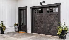 What maintenance needs to be done on a garage door?